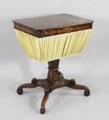 A Regency crossbanded mahogany work table, with pleated silk cottons holder, shaped central column