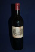 One bottle of Chateau Lafite 1962, Premier Cru Classe, Pauillac; high shoulder, label foxed and