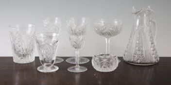 An Edwardian suite of cut crystal drinking glasses, each with hobnail and diamond cut lancet