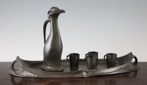 A Kayserzinn penguin or Auk decanter by Hugh Levin, with stamped marks 4358, together with four