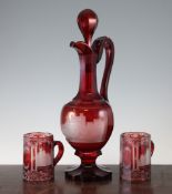 A large German or Bohemian ruby flashed glass ewer and stopper, third quarter 19th century, finely