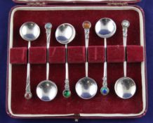 A case set of six 1940`s Arts & Crafts Scottish silver enamel or gem set spoons by Norah Creswick,