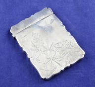 A Victorian silver card case, of rectangular form, finely engraved with bird and butterflies amongst