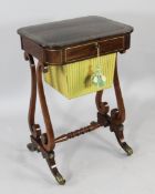 A Regency brass inset rosewood work table, with frieze drawer, silks box and lyre end supports,