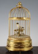 A Reuge musical bird cage automaton, 20th century, 11in.