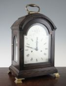 A Georgian III style hour repeating mahogany bracket clock, with arched silvered dial and twin fusee