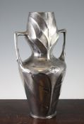 A large Urania Frederich Adler Art Nouveau pewter two handled vase, with stylised decoration, base