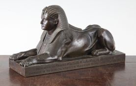 A Victorian bronze sphinx, c.1878, with inscription `Presented to Howard Chatfield Clark Esq by