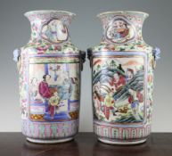 A pair of Chinese famille rose cylindrical vases, 19th century, each painted with court figures in