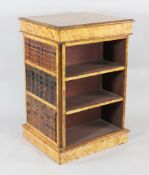 A birds eye maple square pedestal bookcase, with opposing open shelves and faux book sides, W.1ft