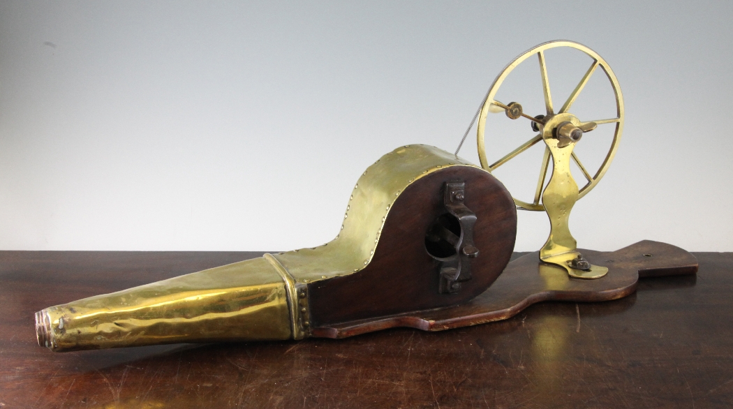 A set of 19th century brass and mahogany mechanical bellows, with seven spoke wheel and handle,