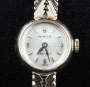 A lady`s 1980`s 9ct gold Rolex Precision wrist watch, with baton and quarterly Arabic numerals, on a