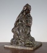 In the manner of Rodin. A 19th century bronze figure of a kneeling woman, on square base,