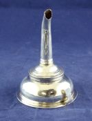 A George III silver wine funnel, with reeded borders and plain thumbpiece, marks quite rubbed,