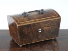 An early 19th century musical necessaire box, the burr elm case with domed lid revealing an internal