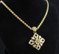 A Victorian 18ct gold, diamond and split pearl set pendant necklace, of diamond form, in fitted box,