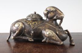 A Chinese bronze censer and cover, in the form of a recumbent goat, Song Dynasty style, 10in.