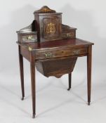 An Edwardian rosewood and boxwood inlaid writing table / work table, the superstructure with