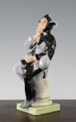 A rare Doulton figure `A Jester`, HN55, modelled by C.J. Noke, Doulton green painted mark and