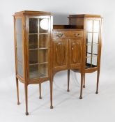 An Edwardian satinwood side cabinet, with drop centre with a single frieze drawer over two