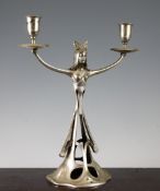 A Continental Art Nouveau plated pewter figural two branch candelabra, with a female bust