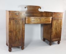 A Victorian mahogany pedestal sideboard, with central bow front drawer, between further drawers