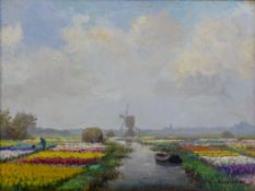 Willem Abraham Wassenaar (1873-1956)oil on wooden panel,Tulip fields, Holland,signed,10.5 x 14in.