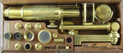 A 19th century mahogany cased travelling and folding lacquered brass microscope, by P. Carpenter,