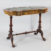 A Victorian walnut and marquetry inlaid writing table, the top with green leather writing skiver