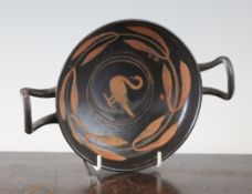 A Greek Xenon ware `swan` kylix, Southern Italy, c.4th century BC, with laurel wreath border, 8in.