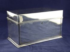 A late Victorian plain silver rectangular bridge casket, by William Comyns, once belonging to The