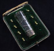 A cased early 20th century paste set rock crystal parasol umbrella handle, with seven (ex eight)
