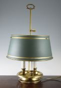 An Empire style brass table lamp, with three lights and green painted toleware shade, 20in.