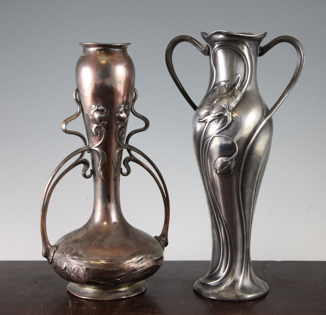 A WMF Art Nouveau pewter two handled poppy vase, together with another similar Art Nouveau WMF vase,