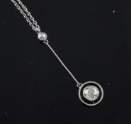 A white gold and two stone graduated diamond drop pendant, total diamond weight approximately