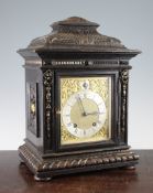 An Edwardian parcel gilt and ebonised oak bracket clock, the gilt dial signed C.S. Proctor,