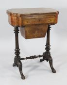 A Victorian burr walnut and boxwood inlaid work / games table, the folding top revealing