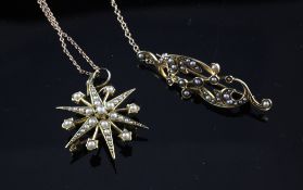 An Edwardian 15ct gold and seed pearl set star pendant, 1.25in, on a 9ct gold fine link chain,