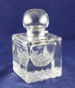 A large early 20th century French silver mounted cut glass inkwell, the lid with ornate etched