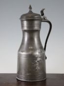 An 18th century Scottish pewter tappit hen measure, engraved with the initials IKHH, with internal