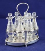 A George III silver mounted cruet stand, by Paul Storr, of oval form, with reeded loop handle,