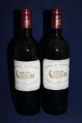 Two bottles of Chateau Margaux 1995, Premier Cru Classe, Margaux; very high fills, lightly scuffed