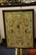 A 19th century Aubusson style needlepoint panel, with flowerheads, flowers, scrolls and swags,