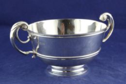 A late Victorian silver presentation rose bowl, of plain circular form, with engraved initials and