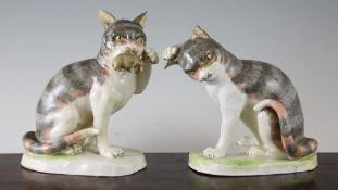 A pair of 19th century German porcelain models of cats 9ins.
