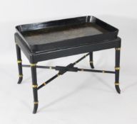 A Henry Clay Regency black japanned rectangular tray, stamped Clay to the base, on a later