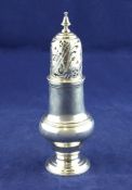 A George III silver baluster sugar caster, with turned finial, John Delmester, London, 1764, 6.75in,