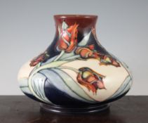 A Walter Moorcroft Rose design vase, of squat onion, inscribed W.M. and impressed marks, 10in.