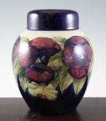 A large Moorcroft `Pansy` ovoid ginger jar and matched cover, c.1915, with white and cobalt blue