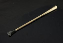 A 1960`s Cartier 9ct gold cigarette holder, with trumpet shaped terminal, reeded stem and plastic